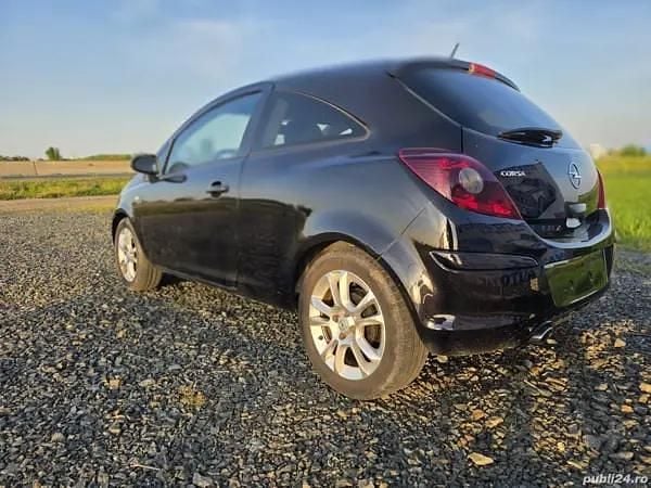 Second-hand Opel Corsa 101 CP (74 kW) 2010 Negru Hatchback