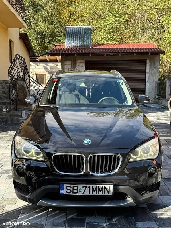 Culoarenegru Utilizat 2013 BMW X1 SUV | 8.500 EUR (Super Preț) - Imagine 1/4