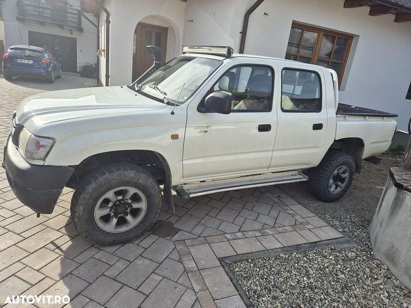 Culoarealb Utilizat 2004 Toyota HiLux Pickup | 9.500 EUR (Preț OK) - Imagine 1/4