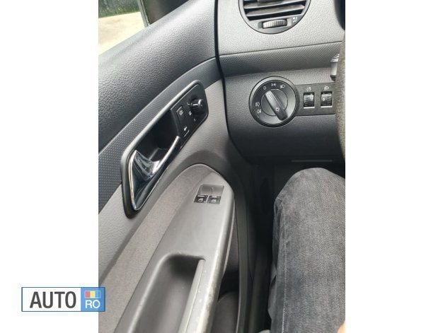 Second-hand VW Caddy 105 CP (77 kW) 2005 Argintiu Monovolum