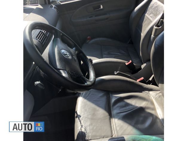 Second-hand VW Sharan 140 CP (102 kW) 2009 Gri Monovolum