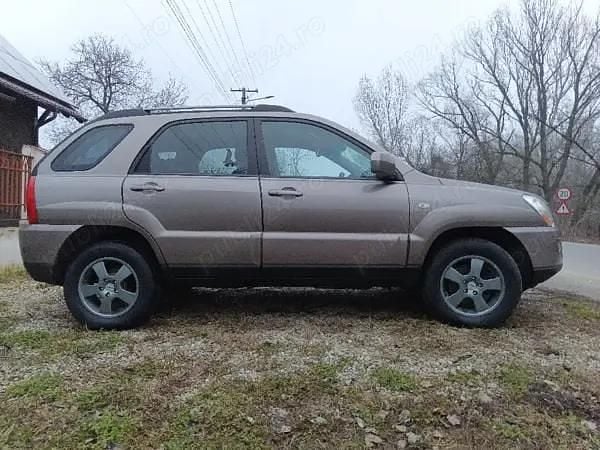 Second-hand Kia Sportage 150 CP (110 kW) 2009 Bej SUV