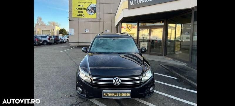 Culoarenegru Utilizat 2013 VW Tiguan Exclusive SUV | 9.950 EUR (Preț bun) - Imagine 1/4