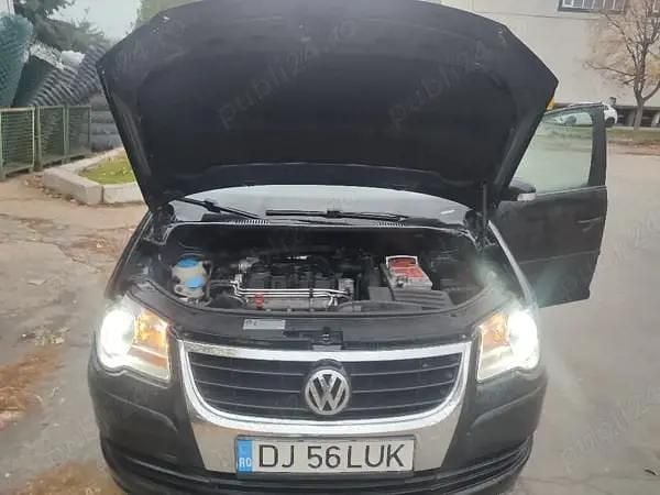 Second-hand VW Touran 105 CP (77 kW) 2009 Negru Monovolum