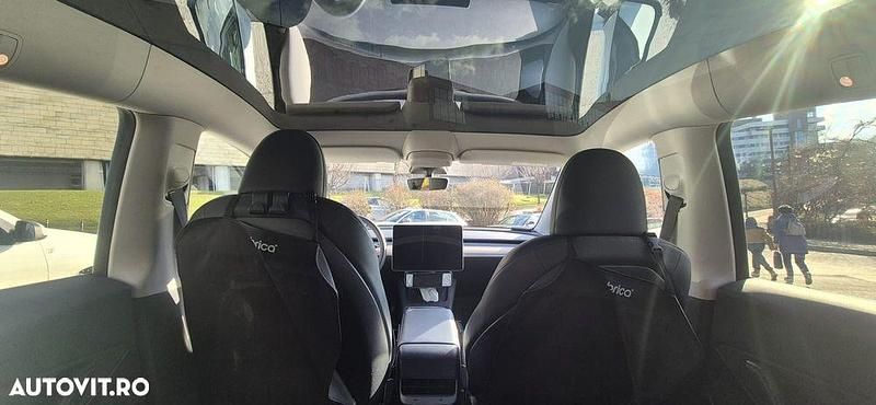 Second-hand Tesla Model Y 150 kW (204 CP) 2022 Culoarealb SUV