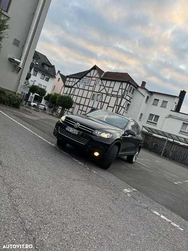Culoarenegru Utilizat 2014 VW Touareg SUV | 15.400 EUR - Imagine 1/4
