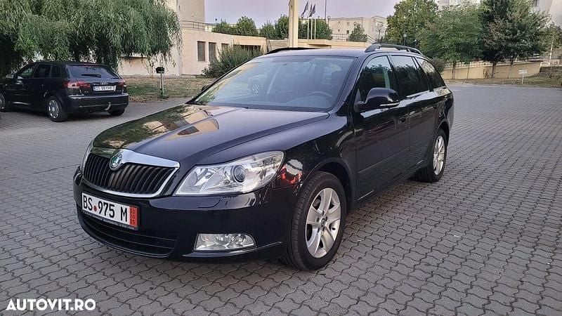 Culoarenegru Utilizat 2012 Skoda Octavia Break | 5.890 EUR (Preț OK) - Imagine 1/4
