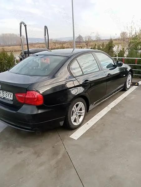 Second-hand BMW 318 143 CP (105 kW) 2010 Negru Berlinǎ