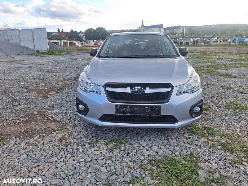Culoareargint Utilizat 2013 Subaru Impreza Comfort Hatchback | 6.490 EUR - Imagine 1/4