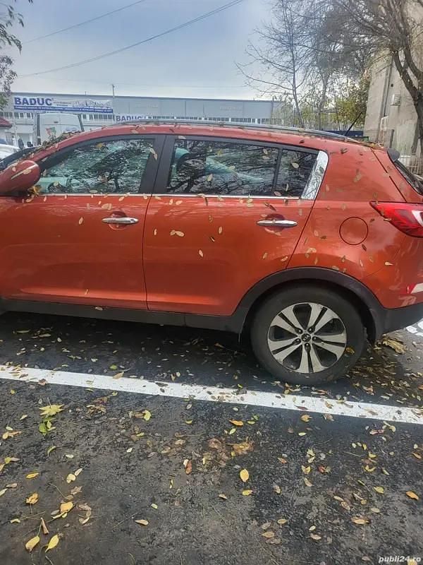 Second-hand Kia Sportage 185 CP (136 kW) 2013 Portocaliu SUV