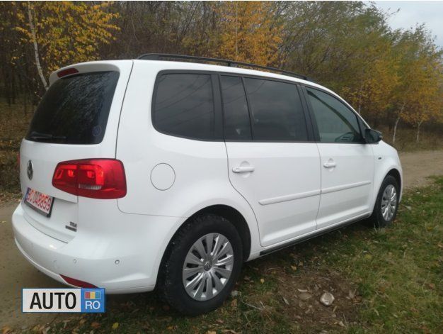 Second-hand VW Touran 105 CP (77 kW) 2012 Alb Monovolum