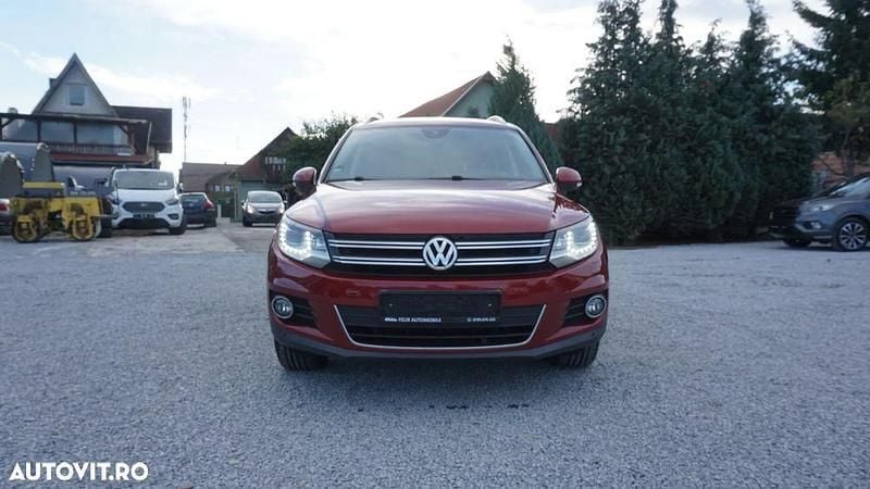 Rosu Utilizat 2013 VW Tiguan Exclusive SUV | 10.990 EUR - Imagine 1/4