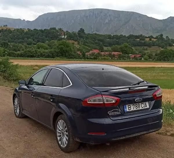 Second-hand Ford Mondeo 115 CP (84 kW) 2014 Albastru Hatchback