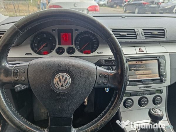 Second-hand VW Passat 140 CP (102 kW) 2009 Negru Berlinǎ