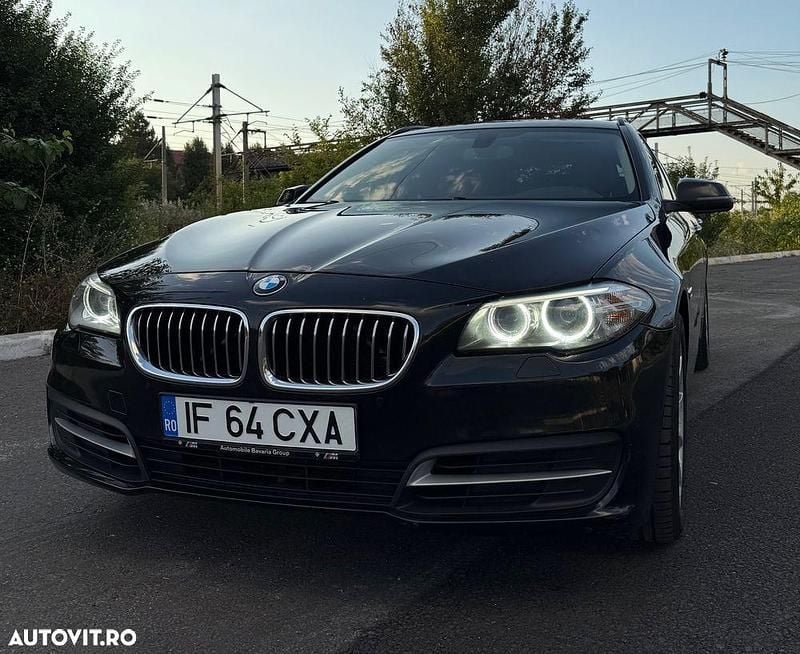 Culoarenegru Utilizat 2015 BMW 520 Comfort Edition Berlinǎ | 11.800 EUR (Super Preț) - Imagine 1/4