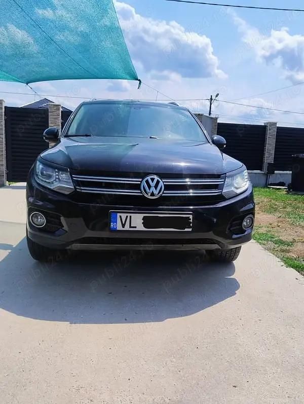 Negru Utilizat 2012 VW Tiguan SUV | 11.100 EUR (Puțin scump) - Imagine 1/4
