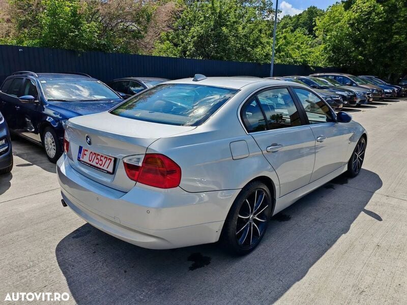 Second-hand BMW 318 143 CP (105 kW) 2007 Argint Berlinǎ