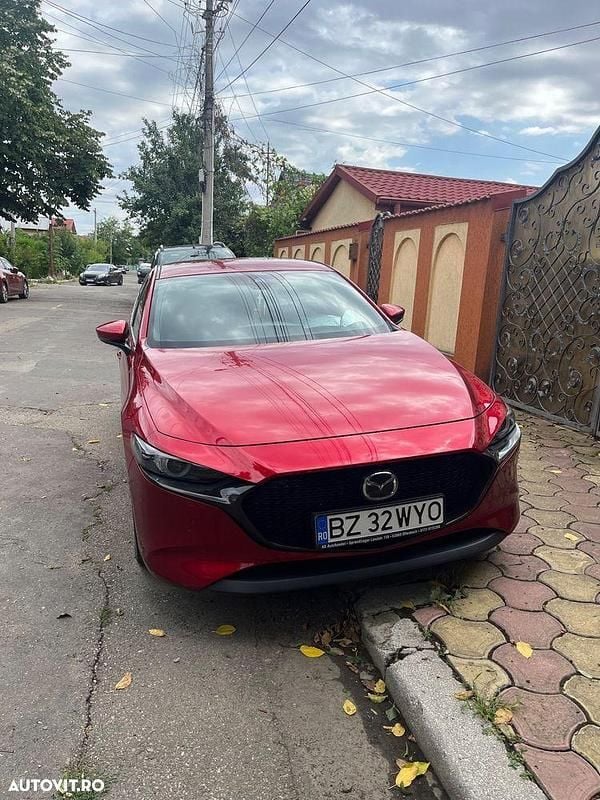 Culoarerosu Utilizat 2019 Mazda 3 Hatchback | 18.000 EUR (Preț bun) - Imagine 1/4