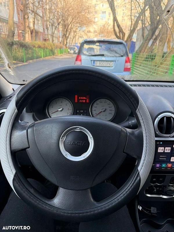 Second-hand Dacia Logan 87 CP (63 kW) 2009 Culoarerosu Berlinǎ