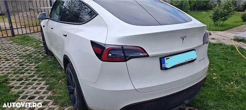 Second-hand Tesla Model Y Long Range AWD 258 kW (351 CP) 2023 Culoarealb SUV