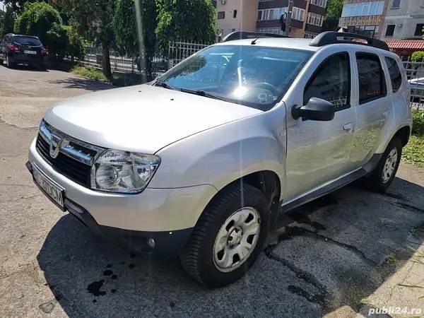 Gri Utilizat 2012 Dacia Duster SUV | 5.950 EUR (Puțin scump) - Imagine 1/4