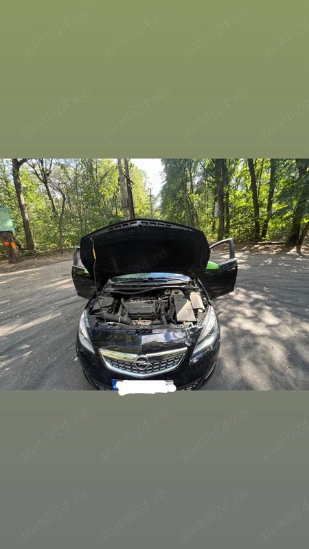 Second-hand Opel Astra Edition 180 CP (132 kW) 2010 Negru Berlinǎ