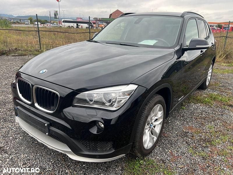 Culoarenegru Utilizat 2014 BMW X1 SUV | 8.690 EUR (Super Preț) - Imagine 1/4