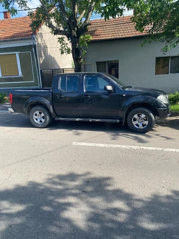 Utilizat 2006 Nissan Navara Pickup | 5.400 EUR (Preț OK) - Imagine 1/4