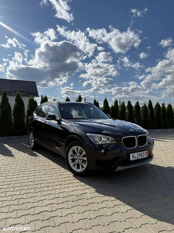 Culoarenegru Utilizat 2013 BMW X1 Sport Line SUV | 6.699 EUR (Super Preț) - Imagine 1/4