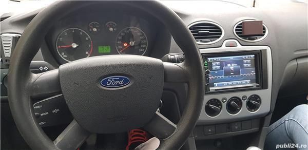 Second-hand Ford Focus 100 CP (73 kW) 2005 Albastru Hatchback