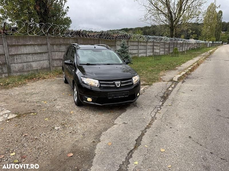 Culoarenegru Utilizat 2015 Dacia Logan MCV Prestige Break | 4.890 EUR (Preț bun) - Imagine 1/4