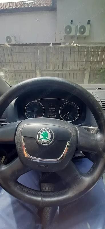 Second-hand Skoda Octavia 77 CP (56 kW) 2012 Gri Berlinǎ