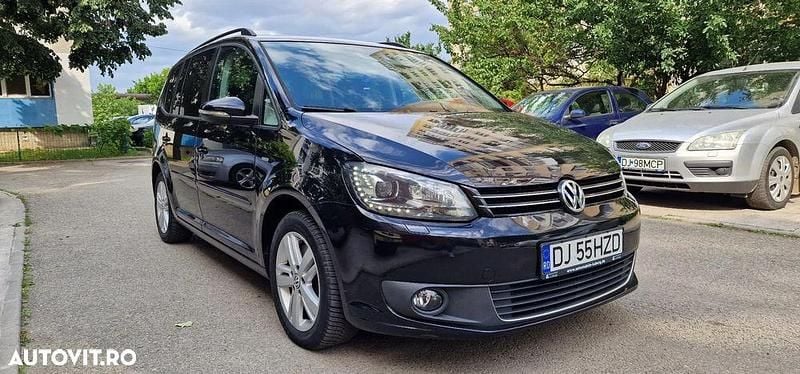 Second-hand VW Touran Match 140 CP (102 kW) 2013 Culoarenegru Monovolum