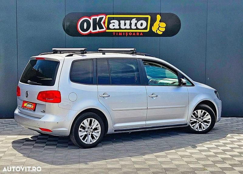 Second-hand VW Touran 105 CP (77 kW) 2013 Culoareargint Monovolum