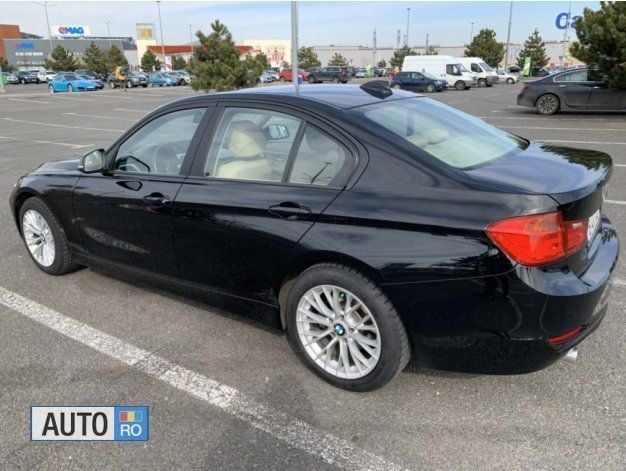 Second-hand BMW 318 Comfort Edition 143 CP (105 kW) 2013 Negru Berlinǎ