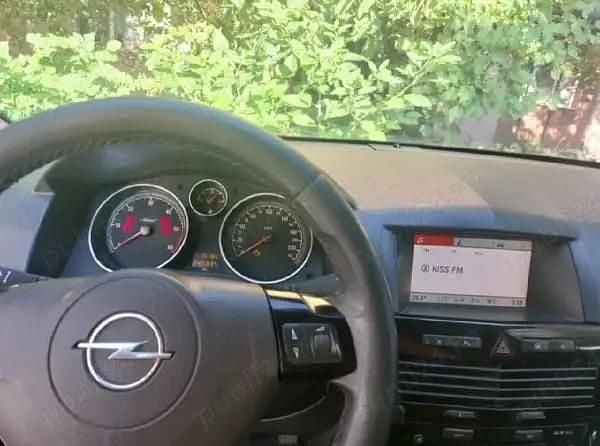 Second-hand Opel Astra 110 CP (80 kW) 2009 Auriu Coupe