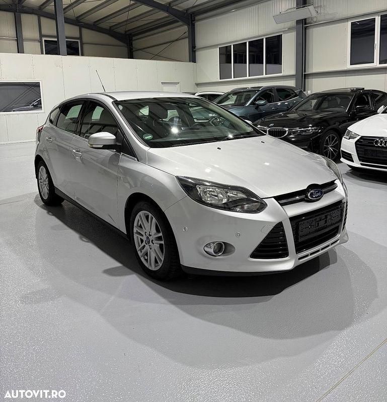 Second-hand Ford Focus Titanium 150 CP (110 kW) 2012 Culoareargint Hatchback
