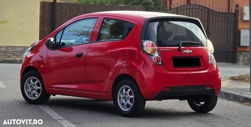 Second-hand Chevrolet Spark 65 CP (47 kW) 2011 Culoarerosu Hatchback
