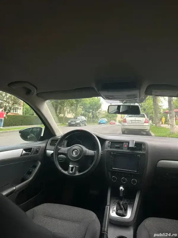 Utilizat 2013 VW Jetta Berlinǎ | 7.400 EUR (Puțin scump) - Imagine 1/4
