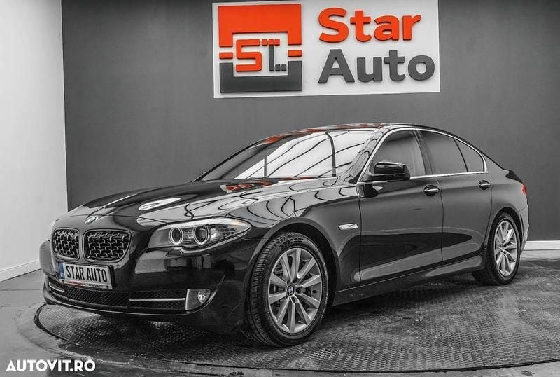 Culoarenegru Utilizat 2013 BMW 520 Berlinǎ | 11.990 EUR (Preț bun) - Imagine 1/4