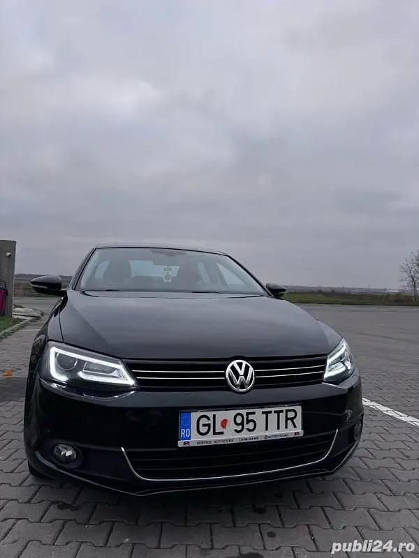 Culoarenegru Utilizat 2012 VW Jetta Highline Berlinǎ | 6.990 EUR (Preț OK) - Imagine 1/4