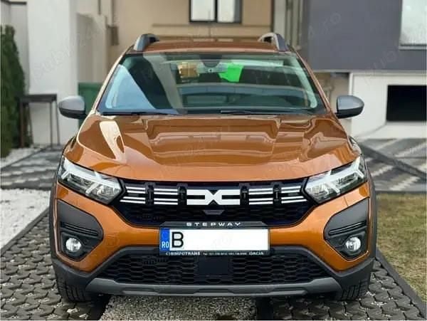 Portocaliu Second-hand 2023 Dacia Sandero Extreme Hatchback | 12.700 EUR (Preț OK) - Imagine 1/4