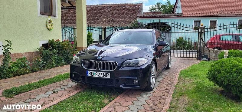 Culoarenegru Utilizat 2011 BMW 520 Break | 9.200 EUR (Preț OK) - Imagine 1/4