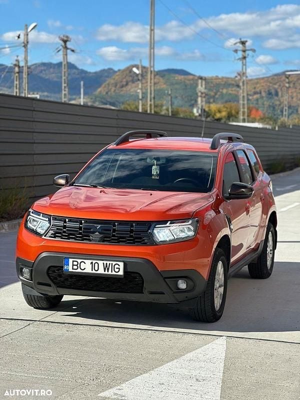 Culoareportocaliu Utilizat 2023 Dacia Duster Comfort SUV | 17.299 EUR (Preț OK) - Imagine 1/4