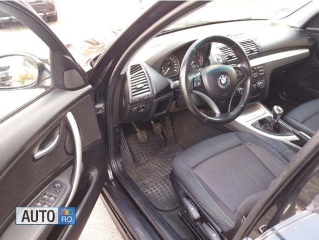 Second-hand BMW 118 143 CP (105 kW) 2009 Negru Hatchback