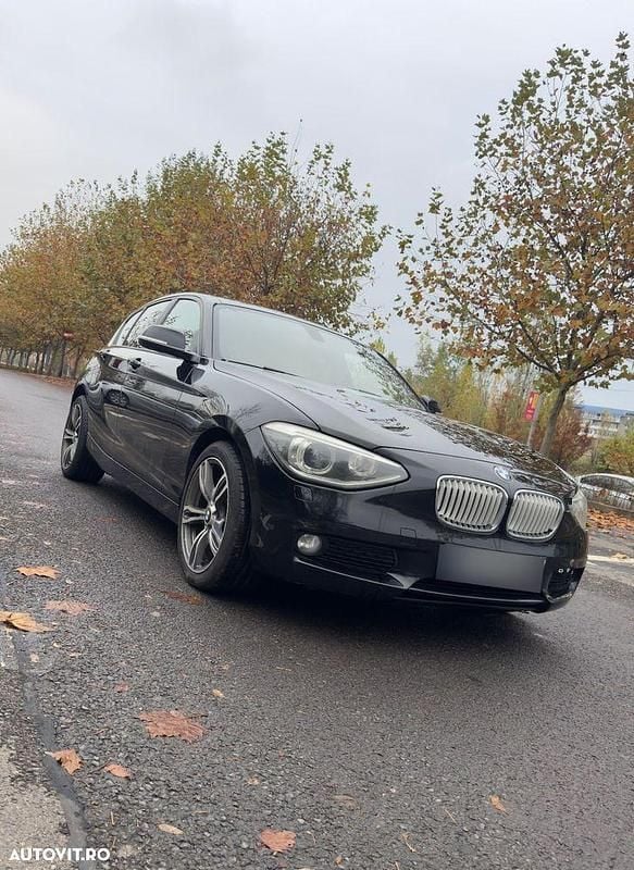 Culoarenegru Utilizat 2012 BMW 118 Hatchback | 5.900 EUR (Preț OK) - Imagine 1/4