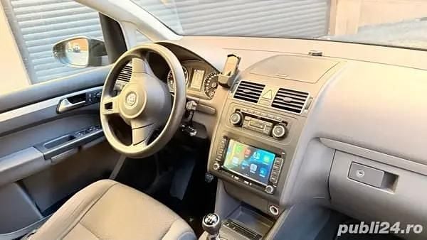 Second-hand VW Touran 110 CP (80 kW) 2012 Monovolum