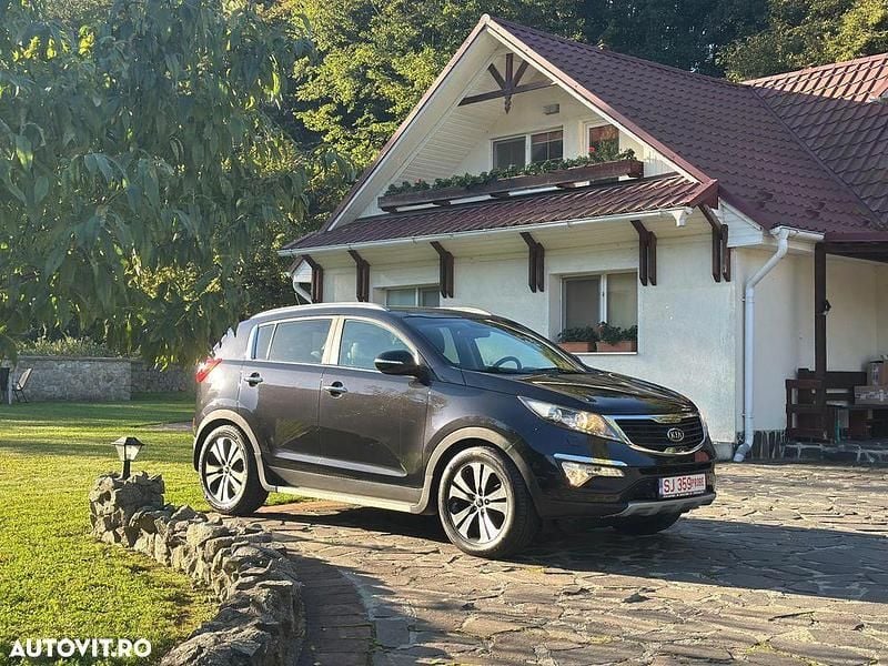 Culoarenegru Utilizat 2012 Kia Sportage Platinum Edition SUV | 9.400 EUR (Preț OK) - Imagine 1/4