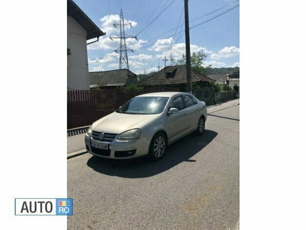 Second-hand VW Jetta 115 CP (84 kW) 2008 Auriu Berlinǎ