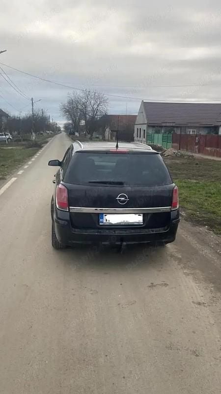 Second-hand Opel Astra 101 CP (74 kW) 2010 Negru Break